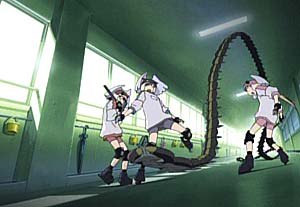 The Alien Party battling an alien similar to a centipede.