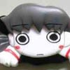 Multiple magnets of a chibi Yuri with strange eyes.